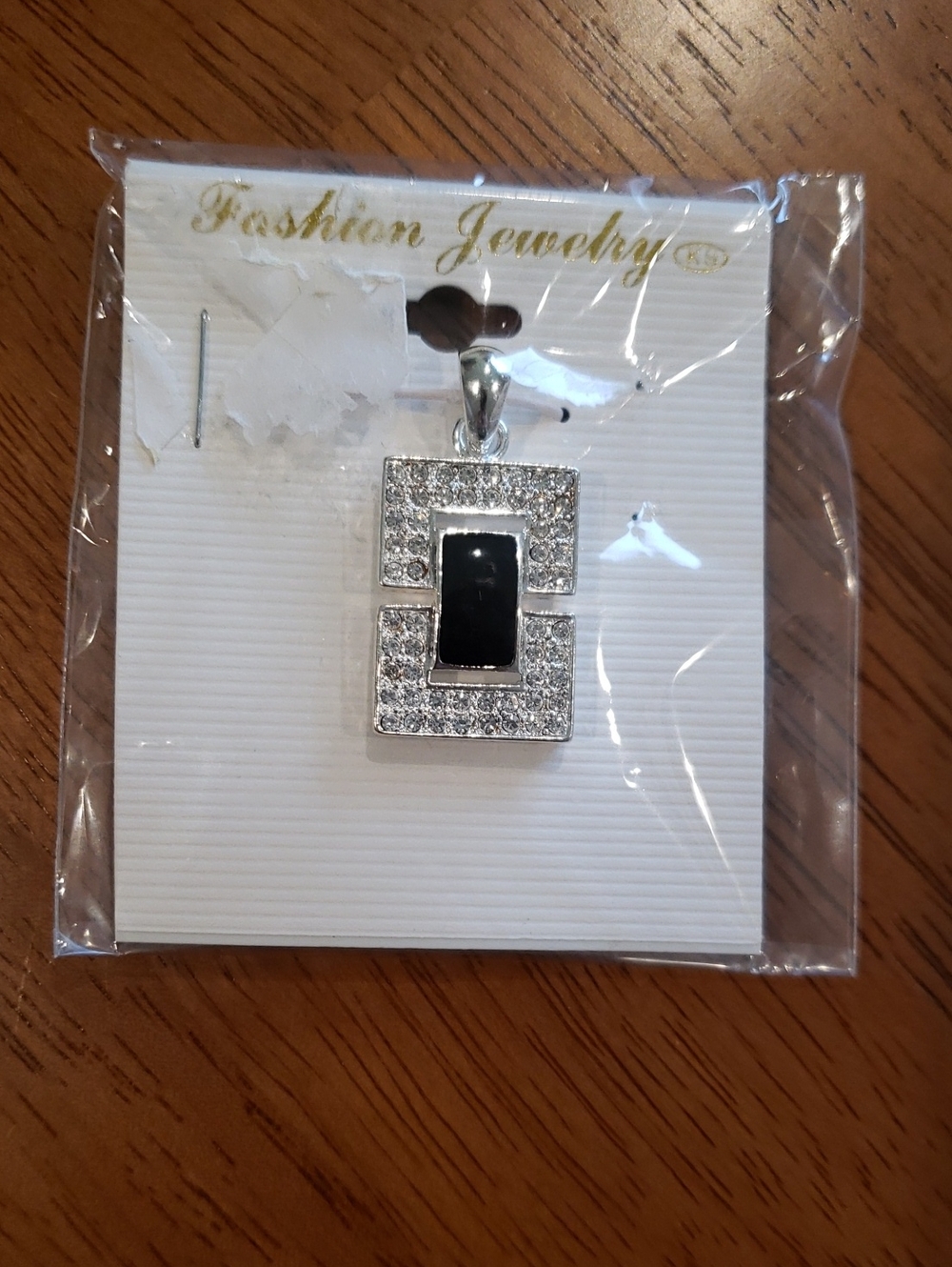 3/$20 Fashion Jewelry Silver-Tone Pendant with Black Center and Crystal Accents